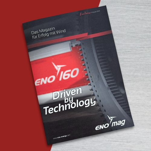 EnoMag 2024 mit dem Slogan "Driven by Technology". Das Cover zeigt ein Teil einer Windturbine, die in Rot und Grau gestaltet ist. Oben steht Das Magazin für Erfolg mit Wind